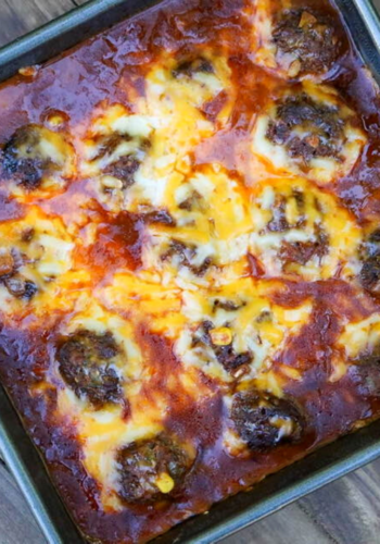 The baking dish of all of the enchilada meatballs