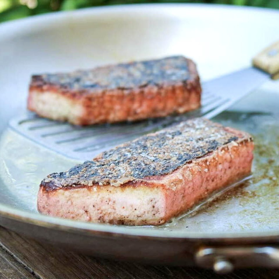 Vegan salmon fillets in a pan
